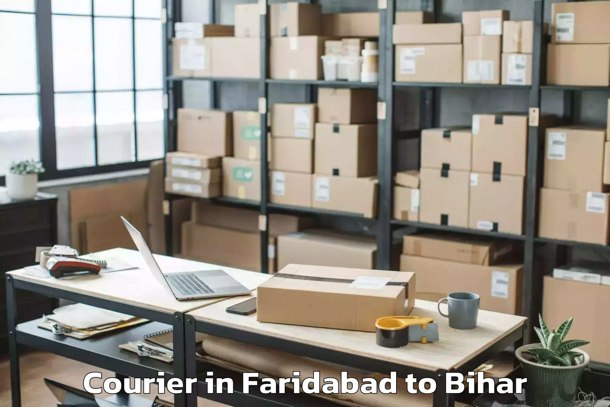 Reliable Faridabad to Charaut Courier